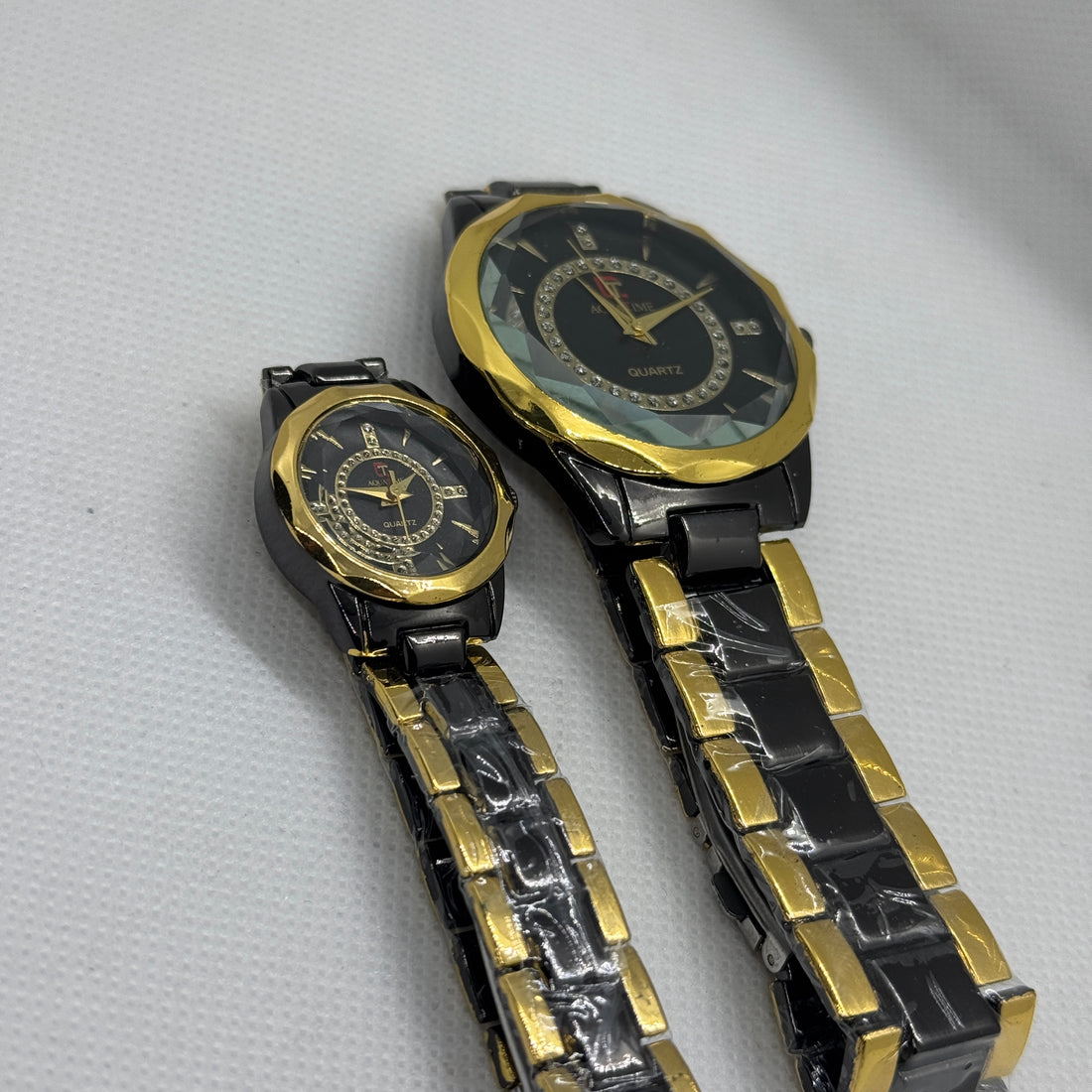 Golden and Black Couple Watches