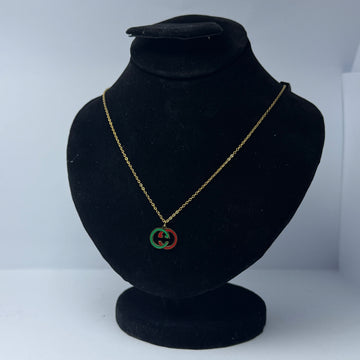 Gucci logo pendant with golden chain