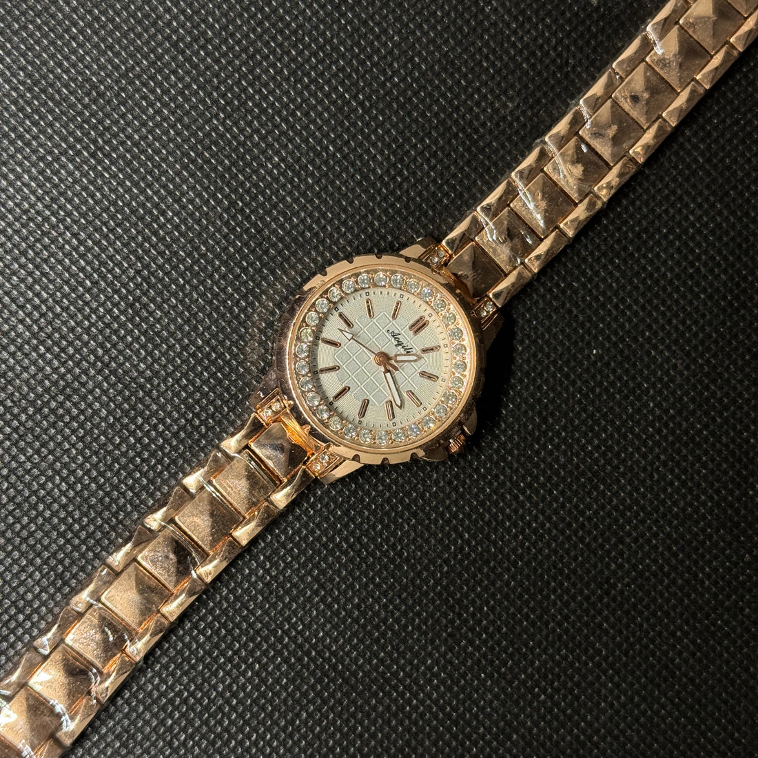 Luxury women's watch with silver diamonds.